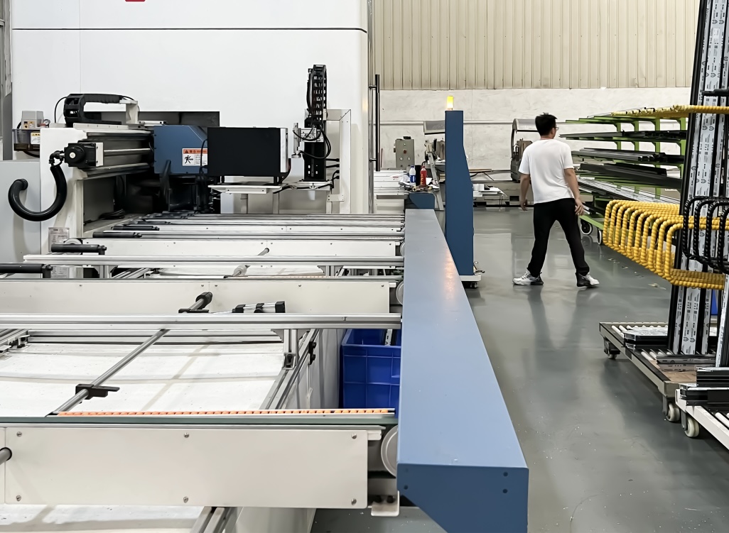Automated CNC cutting and machining line for architectural aluminum window profiles in China factory