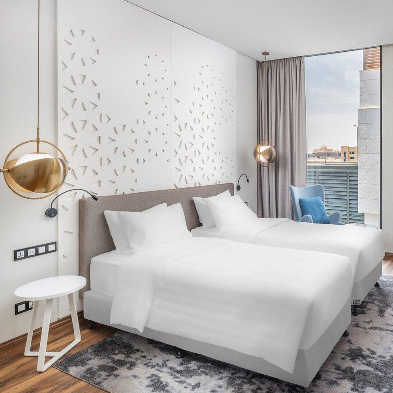 Hotel property undergoing brand-mandated PIP renovation with structural upgrades and exterior improvements